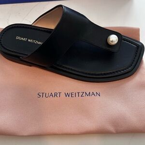 Stuart Weitzman Goldie Flat Sandals – Black Leather with Pearl Accent